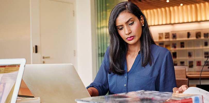 Woman working alone at desk