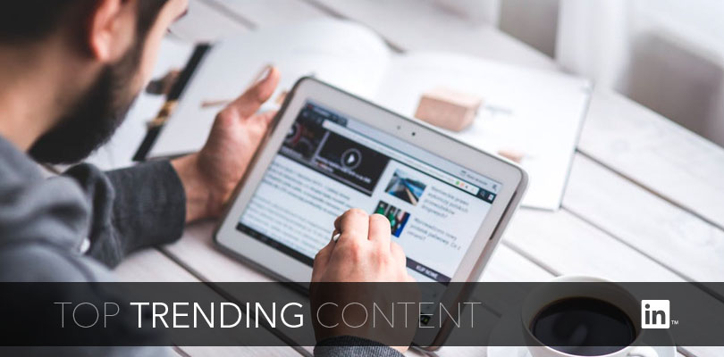 Man Viewing Contextual Online Ads on Tablet