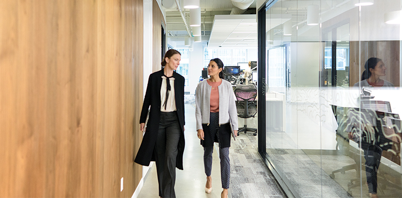 sales and marketing conferring together