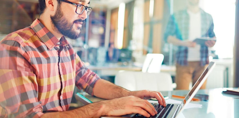 Guy working on laptop