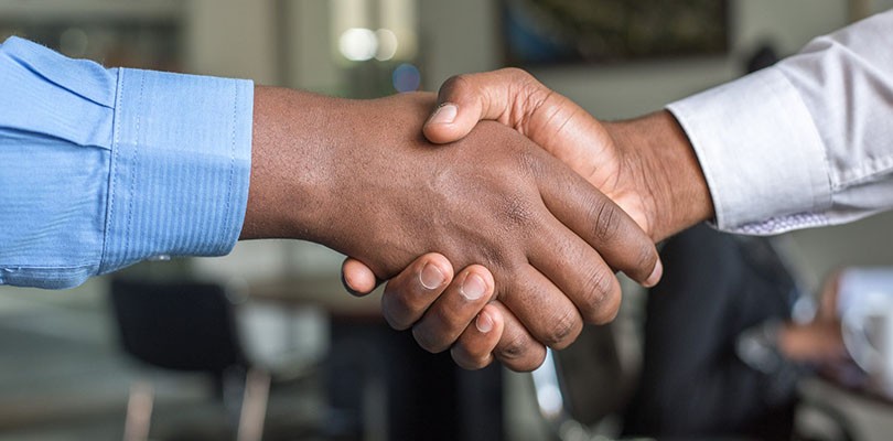 Two Business Partners Shaking Hands