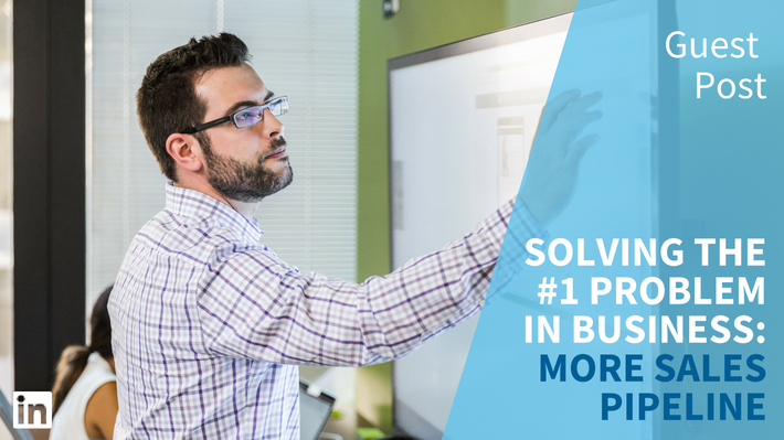 man solving a problem on a whiteboard