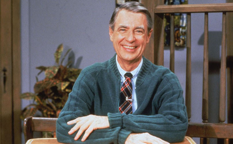 Photo of Fred Rogers smiling and looking directly at camera
