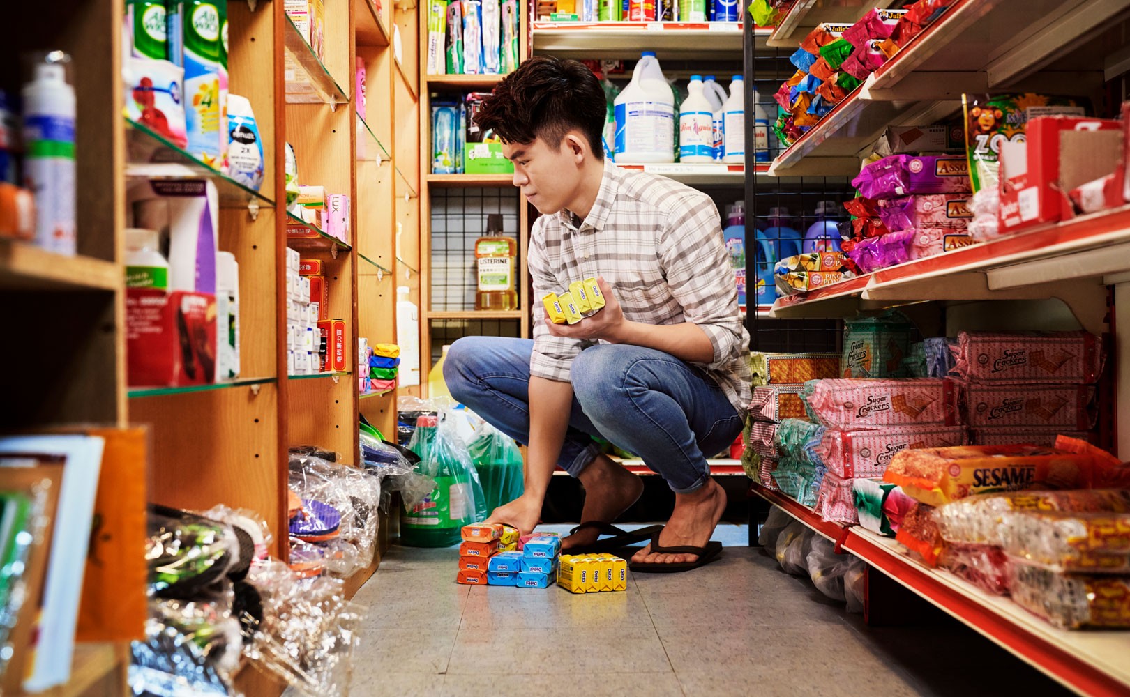 Photo of grocery clerk stocking shelves