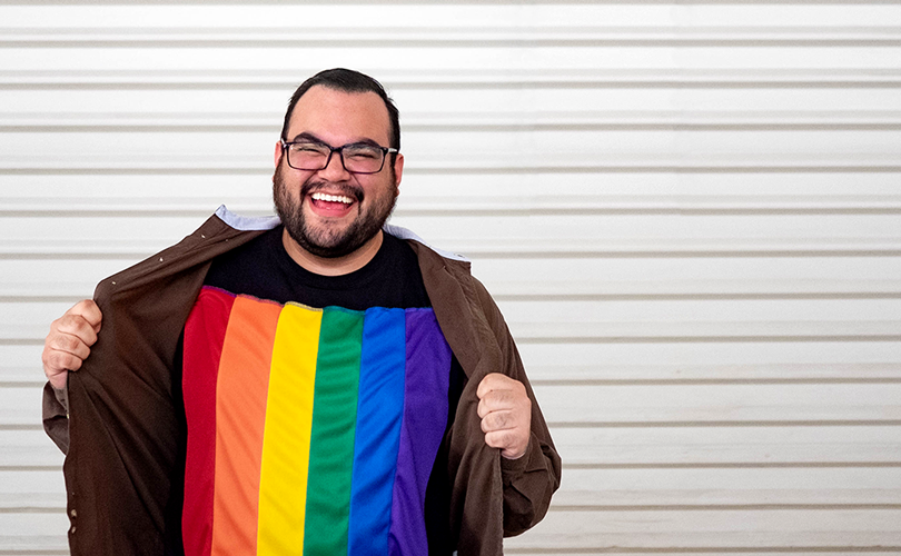Photo of HP employee wearing shirt featuring pride flag