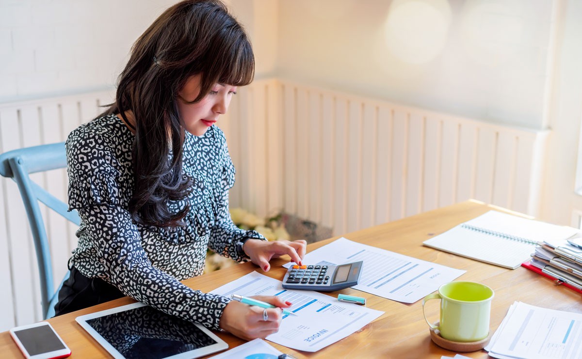Photo of woman working at desk