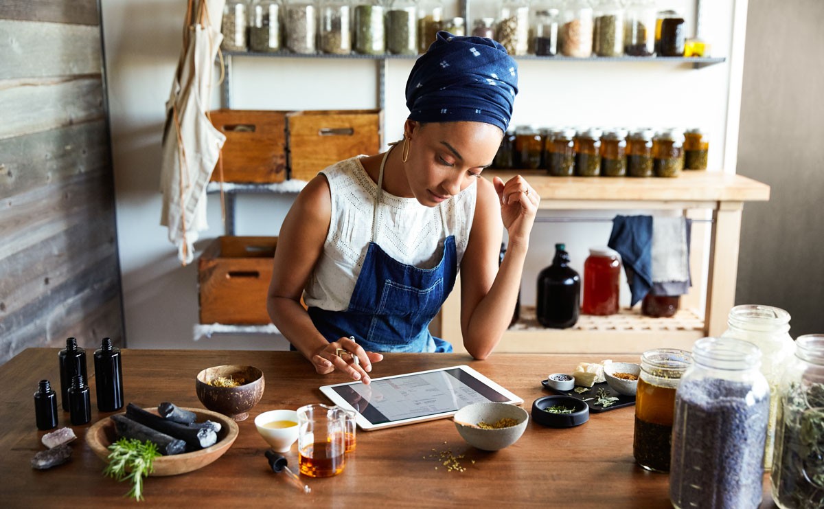 Photo of woman working in apothecary