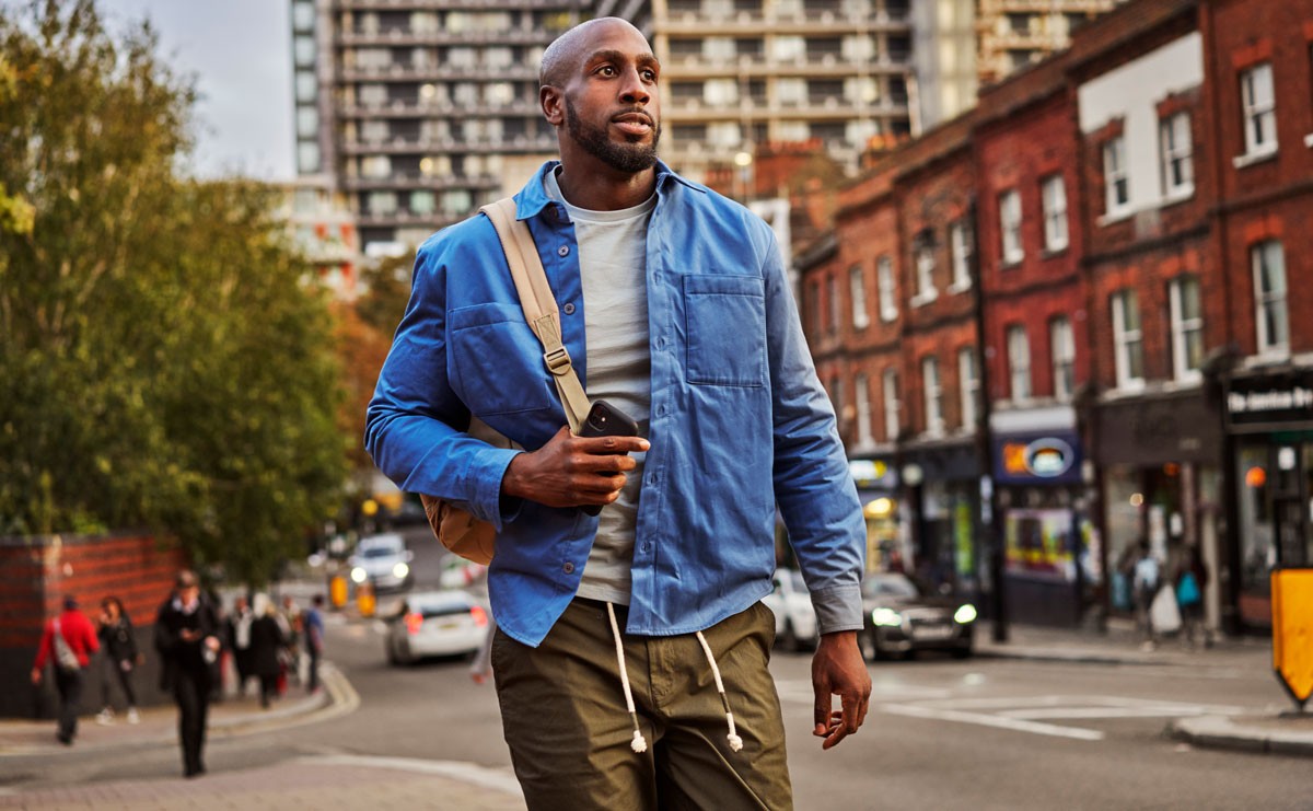 Photo of man walking outside