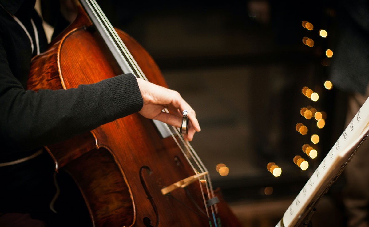 Photograph of cellist playing instrument