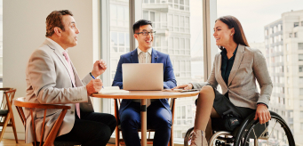 Several professionals in a meeting.