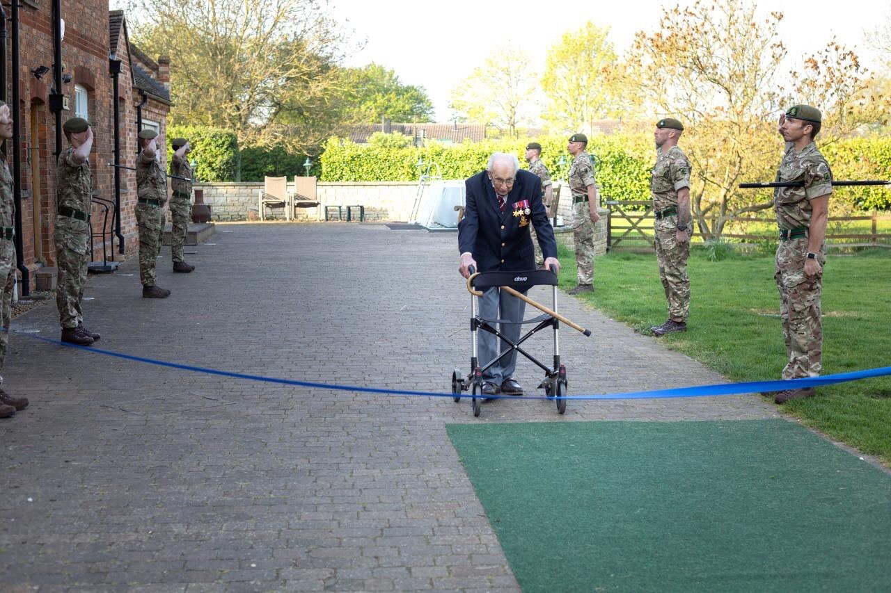 An image of the UK's Captain Tom Moore finishing his fundraiser for the NHS.